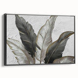 Framed canvas wall art showcasing an abstract design with dynamic strokes and lines in a modern black frame, perfect for contemporary home decor.