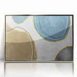 Framed abstract wall art featuring dynamic strokes and lines in silver tones, designed to enhance modern decor, set against a sleek white background.