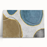 Abstract canvas wall art featuring vibrant strokes and lines in shades of blue, orange, and yellow, leaning against a textured wall, ideal for modern decor.