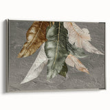 Framed canvas wall art featuring an abstract design with strokes and lines in shades of silver and gray, offering a modern touch to any decor.