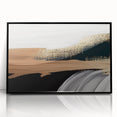 Framed abstract wall art featuring dynamic strokes and lines in various shades of blue and black, designed to enhance modern interior decor with a contemporary flair.