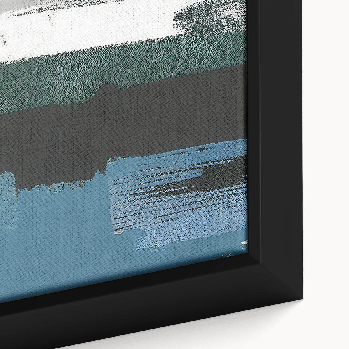 Close-up of a framed abstract wall art piece showcasing vibrant strokes and lines in shades of blue, orange, and yellow, ideal for modern home decor.