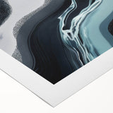 Abstract wall art featuring vibrant strokes and lines in a modern design, showcasing bold colors of blue, orange, and yellow on a rolled canvas, perfect for contemporary decor.