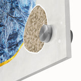 Close-up of an abstract wall art piece showcasing vibrant strokes and lines in hues of blue, orange, and green, designed for modern decor. Perfect for enhancing contemporary living spaces.