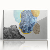 Framed acrylic wall art featuring an abstract design of colorful strokes and lines, set against a white background, perfect for modern home decor.