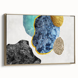 Framed canvas wall art featuring an abstract design of gold strokes and lines, elegantly displayed with a sleek side view, ideal for modern home decor.