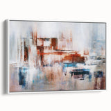 Framed canvas wall art showcasing an abstract design of colorful strokes and lines, presented in a modern white frame, ideal for contemporary decor.