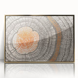 Framed wall art featuring an abstract design of gold strokes and lines on a dark background, perfect for modern home decor.