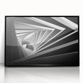 Framed acrylic print of large abstract wall art featuring geometric shapes in black and gray.