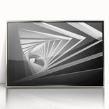 Art deco poster featuring abstract architecture in silver and gray tones on a framed acrylic.