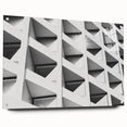 Large abstract wall art on acrylic glass featuring swirling gray and white patterns.