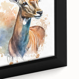 Close-up of a framed canvas wall art featuring a vibrant antelope design with intricate details and earthy tones, ideal for wildlife enthusiasts and home decor.
