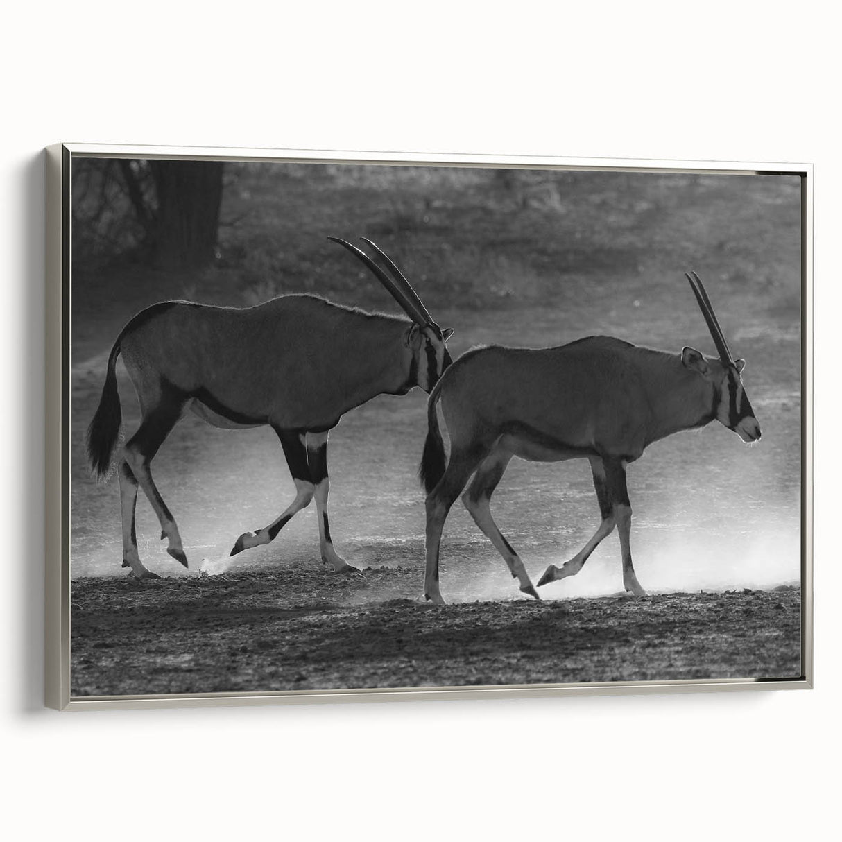 Framed wall art featuring a sleek silver-colored antelope design, showcasing intricate details and a modern aesthetic, perfect for enhancing contemporary decor.