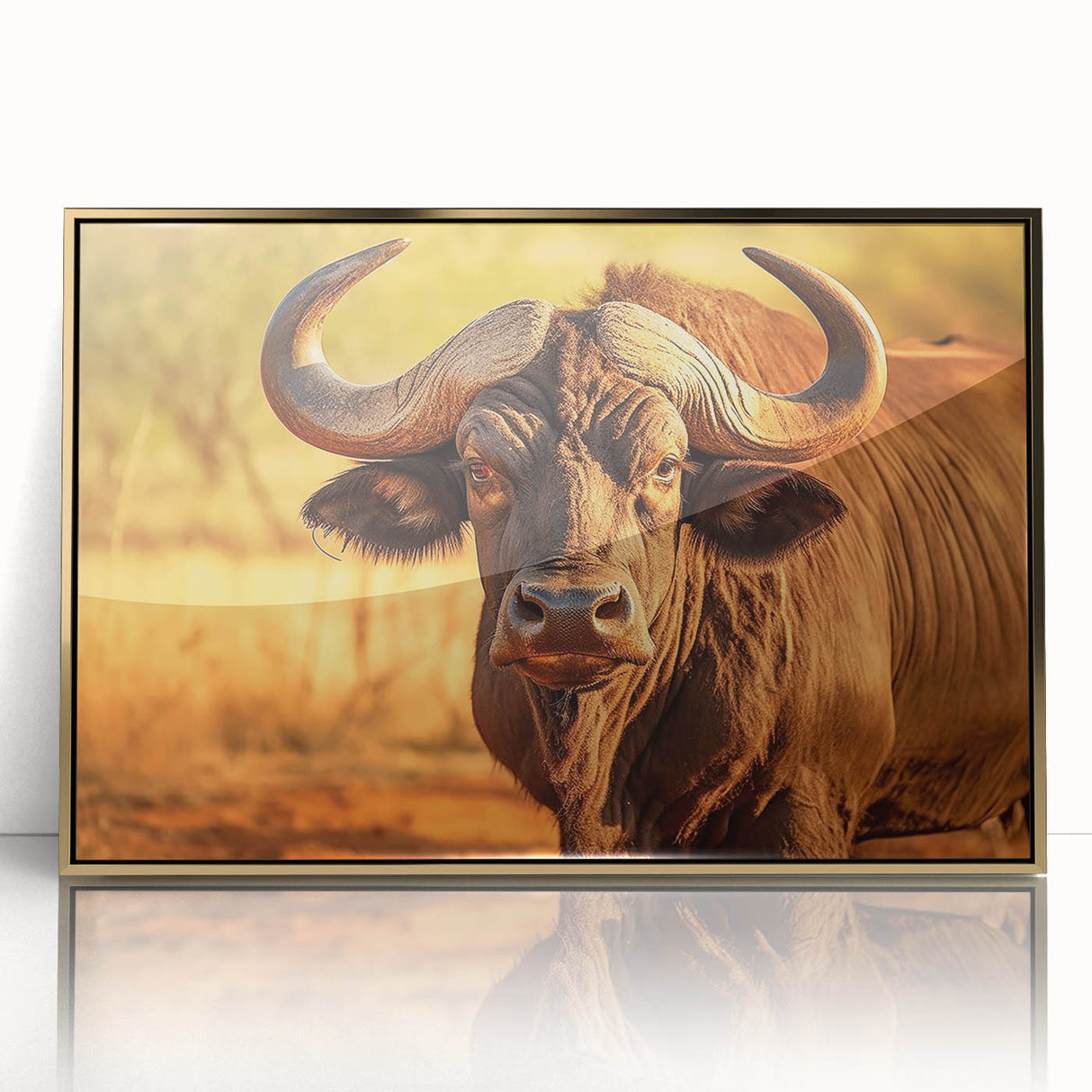 A framed art piece showcasing a majestic buffalo design with intricate details, featuring a gold acrylic front. This wildlife-inspired wall art adds elegance to any room.