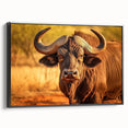 Framed canvas wall art depicting a striking side view of a buffalo, showcasing detailed textures and rich colors, perfect for wildlife-themed decor.