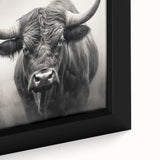 Close-up view of a framed canvas wall art featuring a majestic buffalo in a wild landscape, showcasing intricate details and vibrant colors, perfect for nature enthusiasts.
