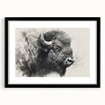 Black-framed wall art featuring a detailed illustration of a buffalo, showcasing intricate design elements and vibrant colors, perfect for wildlife enthusiasts and home decor.