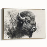 Framed wall art showcasing a side view of a majestic buffalo, designed by Bisson, featuring a gold border. This canvas piece adds elegance to wildlife decor.