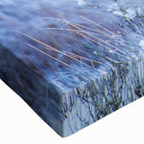 Close-up view of a stretched canvas wall art piece featuring a detailed design of a buffalo, showcasing rich colors and textures ideal for wildlife enthusiasts and home decor.