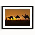 Framed wall art showcasing a stylized camel design with intricate details, set against a black matting, perfect for enhancing modern home decor and animal-themed spaces.
