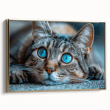 Framed canvas wall art featuring a stylish cat design, highlighted by a gold frame. The artwork showcases vibrant colors and intricate details, perfect for modern decor.