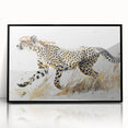 Framed wall art featuring a striking black and white design of a cheetah, showcasing intricate details and textures, perfect for wildlife enthusiasts and modern decor.