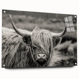 Acrylic wall art featuring a vibrant cow design, showcasing colorful patterns and textures, displayed from the side with visible metal pins for mounting.