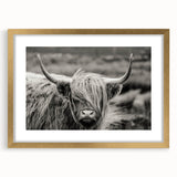 Framed wall art featuring a striking cow design with a gold mat, showcasing intricate details and a modern aesthetic, perfect for animal lovers and home decor enthusiasts.