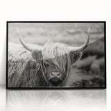 Framed wall art featuring a striking black and white cow design, showcasing intricate details against a minimalistic background, perfect for animal lovers and modern decor.