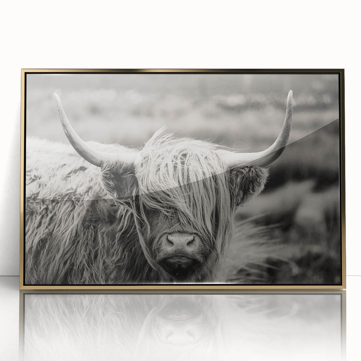 Framed wall art featuring a stunning cow design with intricate details, set in a gold-accented frame, perfect for adding a touch of nature-inspired elegance to any room.