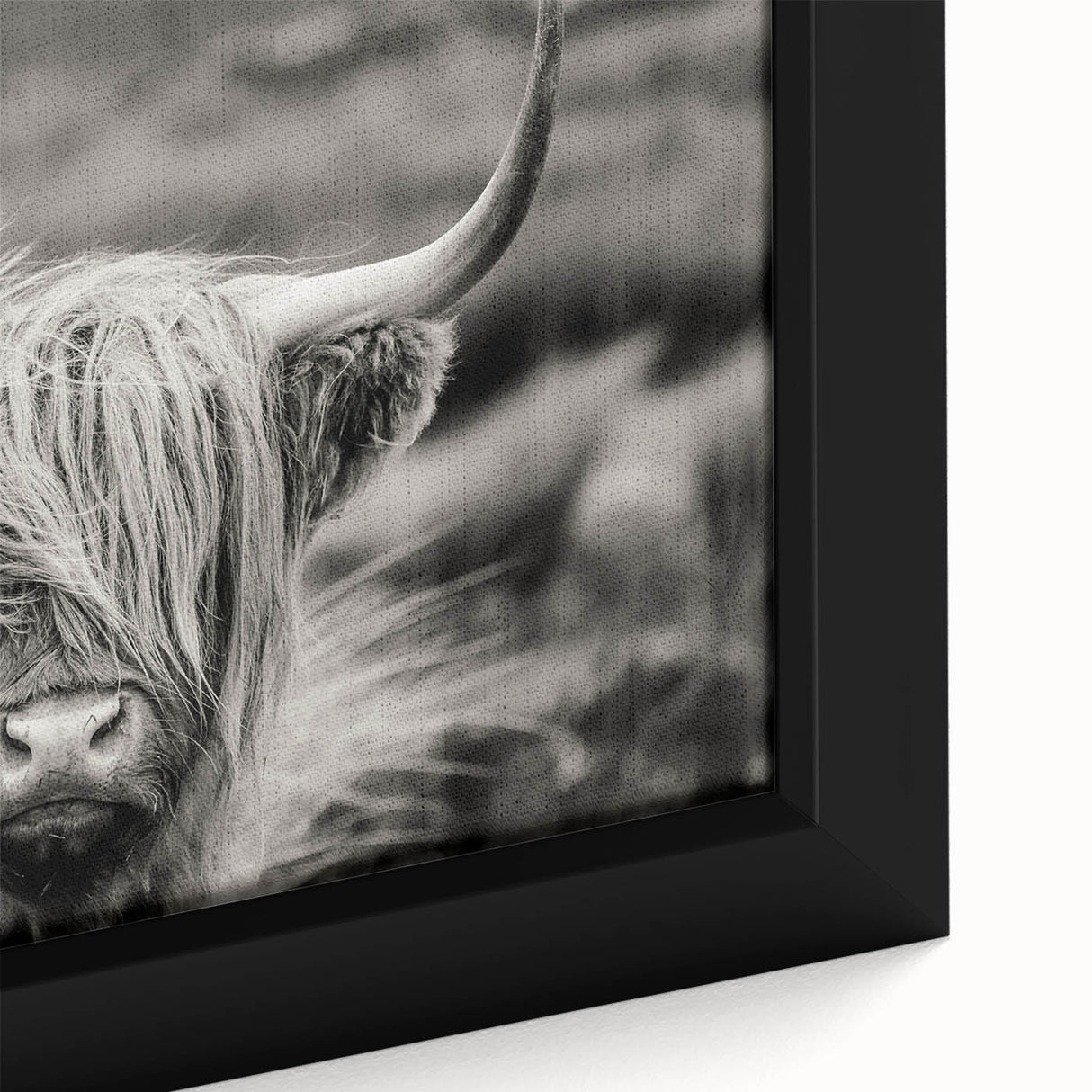 Close-up of a framed canvas wall art featuring a vibrant cow design, showcasing intricate details and textures, perfect for adding a rustic touch to home decor.