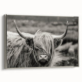 Framed canvas wall art showcasing a silver-toned cow design, ideal for animal lovers, adding a modern touch to home decor with its sleek side view.