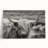 Stretched canvas wall art featuring a vibrant cow design, showcasing intricate details and colors, perfect for adding a rustic charm to home decor.