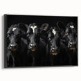 Framed canvas wall art featuring a black and white cow design, capturing intricate details and textures, perfect for animal lovers and rustic decor enthusiasts.