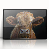 Framed acrylic wall art featuring a striking black and white cow design, perfect for animal lovers and modern decor enthusiasts, showcased in a sleek black frame.