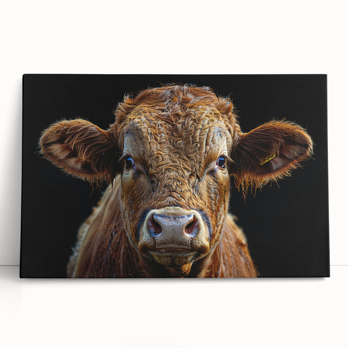Colorful stretched canvas wall art featuring a whimsical cow design, leaning against a wall, perfect for adding a playful touch to home decor. Ideal for animal lovers.