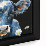 Close-up of a framed canvas wall art featuring a detailed cow design, showcasing vibrant colors and intricate textures, perfect for animal lovers and rustic decor.
