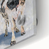 Close-up of a vibrant acrylic glass wall art piece featuring a striking cow design, showcasing intricate details and bold colors, perfect for animal lovers.