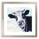 Framed wall art showcasing a silver mat and a vibrant cow design, perfect for adding a rustic touch to home decor. Ideal for animal lovers and art enthusiasts.