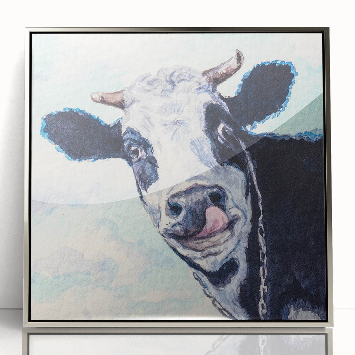 Framed acrylic wall art showcasing a vibrant cow design from the Animals A Wild Life collection, featuring a silver frame that enhances its modern aesthetic.
