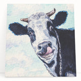 Stretched canvas wall art featuring a colorful cow design from the Animals A Wild Life collection, showcasing vibrant colors and intricate details, perfect for animal lovers.