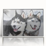Framed wall art collection featuring a stunning design of playful dogs in a wild setting, displayed in a sleek white frame, perfect for animal lovers and home decor.