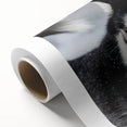 Colorful rolled canvas featuring a vibrant design of wild dogs in a natural setting, ideal for animal lovers and home decor enthusiasts, packaged securely for delivery.