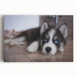 Stretched canvas wall art featuring a vibrant design of playful dogs in a natural setting, showcasing detailed colors and textures for a lively home decor accent.