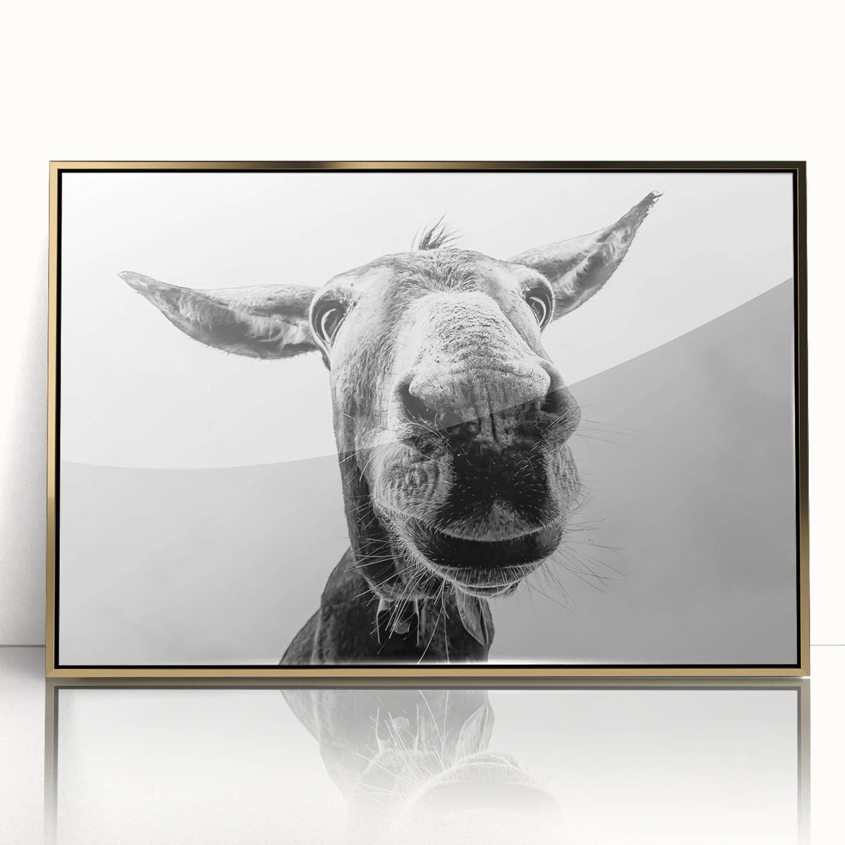 Framed wall art featuring a stylish donkey design with an acrylic gold finish, perfect for adding a touch of elegance to any modern decor. Ideal for animal lovers and art enthusiasts.