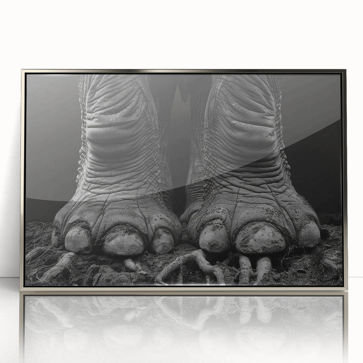 Framed wall art featuring a detailed illustration of an elephant, showcasing intricate designs in a silver frame, perfect for wildlife enthusiasts and home decor.