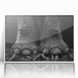Framed wall art featuring a striking design of an elephant in a natural setting, with white accents and a contemporary style, perfect for animal lovers and home decor enthusiasts.