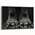 Framed canvas wall art showcasing a majestic elephant in a black and white design, emphasizing its intricate details and textures, perfect for nature-inspired decor.