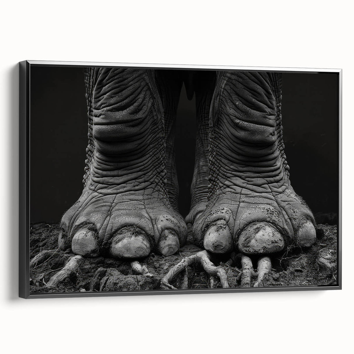 Framed canvas wall art showcasing a majestic elephant in a black and white design, emphasizing its intricate details and textures, perfect for nature-inspired decor.