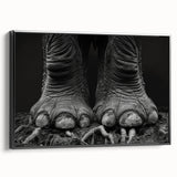 Framed canvas wall art showcasing a majestic elephant in a black and white design, emphasizing its intricate details and textures, perfect for nature-inspired decor.